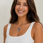 Couples photo necklace shown on a silver-tone beaded chain