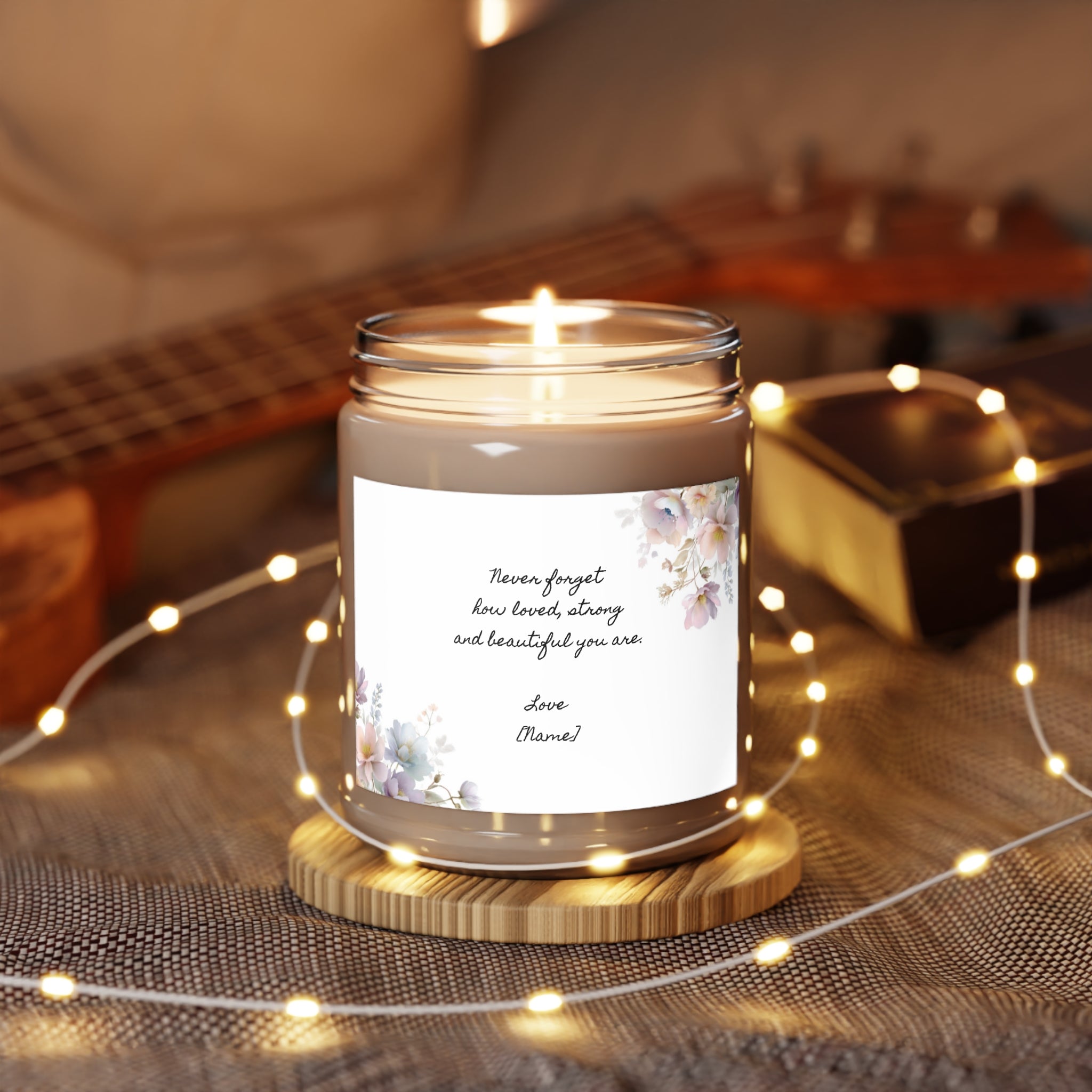 Close-up of the personalized uplifting message on the candle