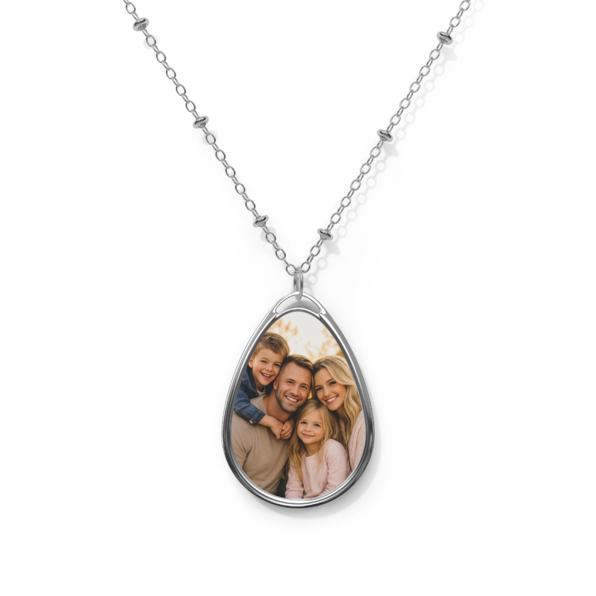Family photo on a personalized teardrop pendant necklace on a silver beaded chain