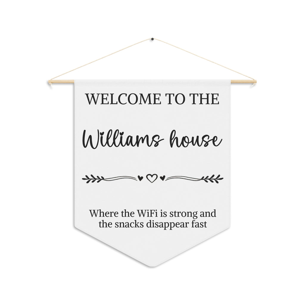 Personalized funny welcome pennant with a family name and the words Where the WiFi is strong and the snacks disappear fast