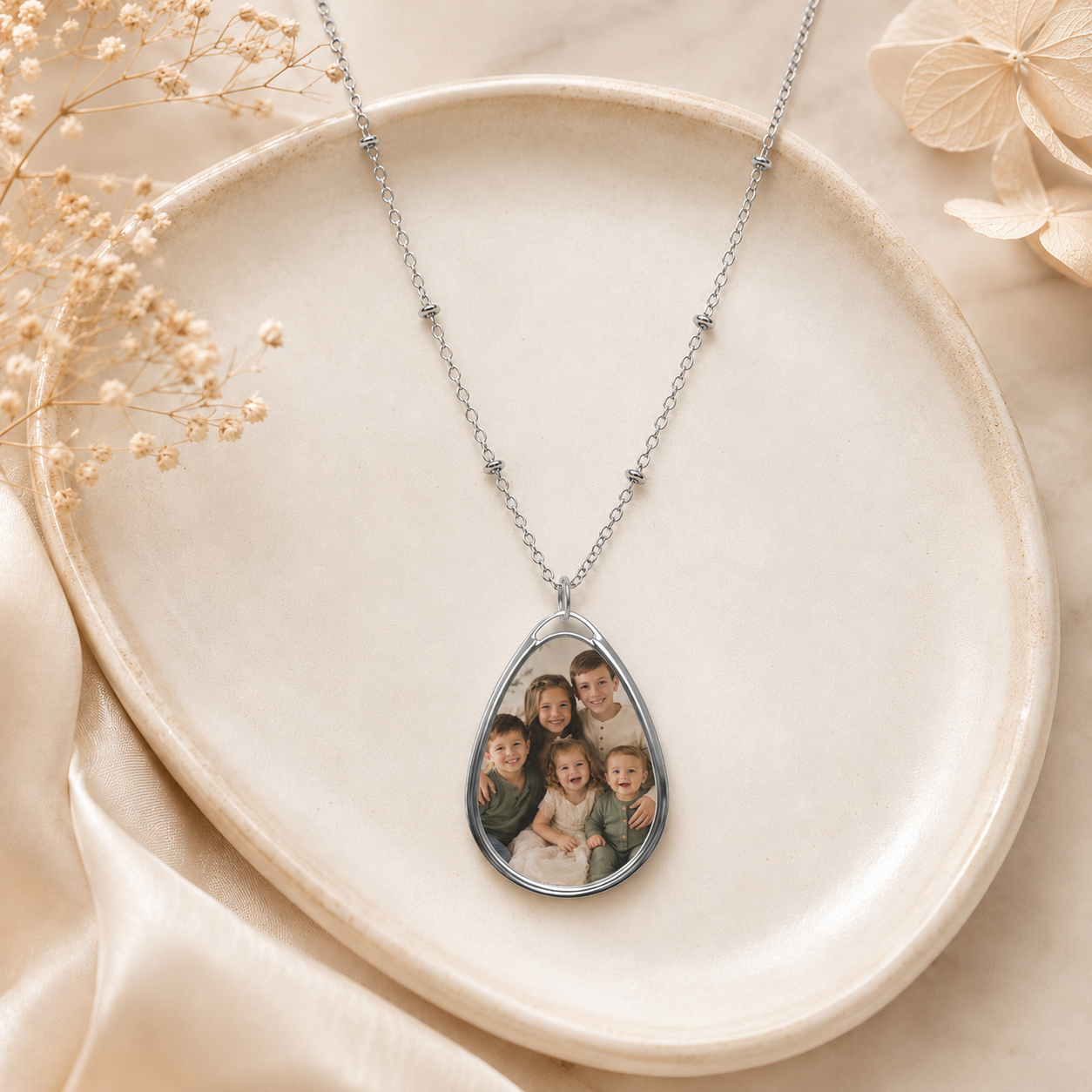 Close-up of a personalized kids photo pendant necklace
