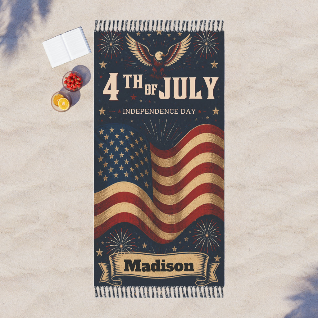 Patriotic 4th of July beach towel spread out on the sand