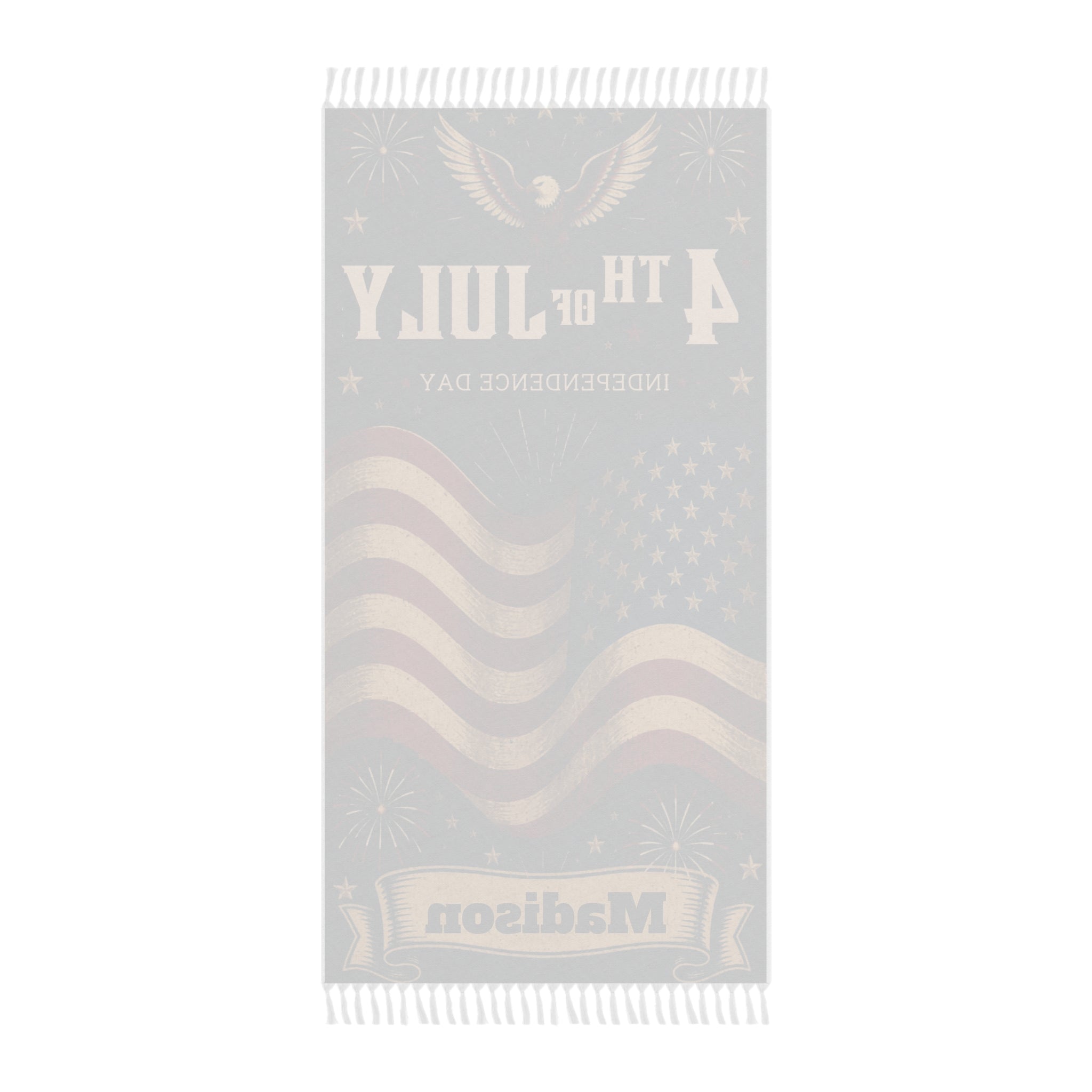 Boho tasseled 4th of July beach towel draped on a lounger