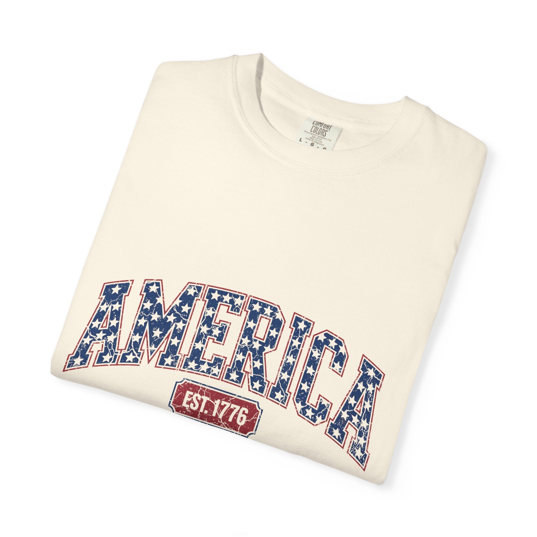 Flat lay of personalized America Est 1776 4th of July tee