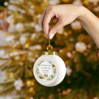 Baby announcement Christmas ornament styled with holiday decor