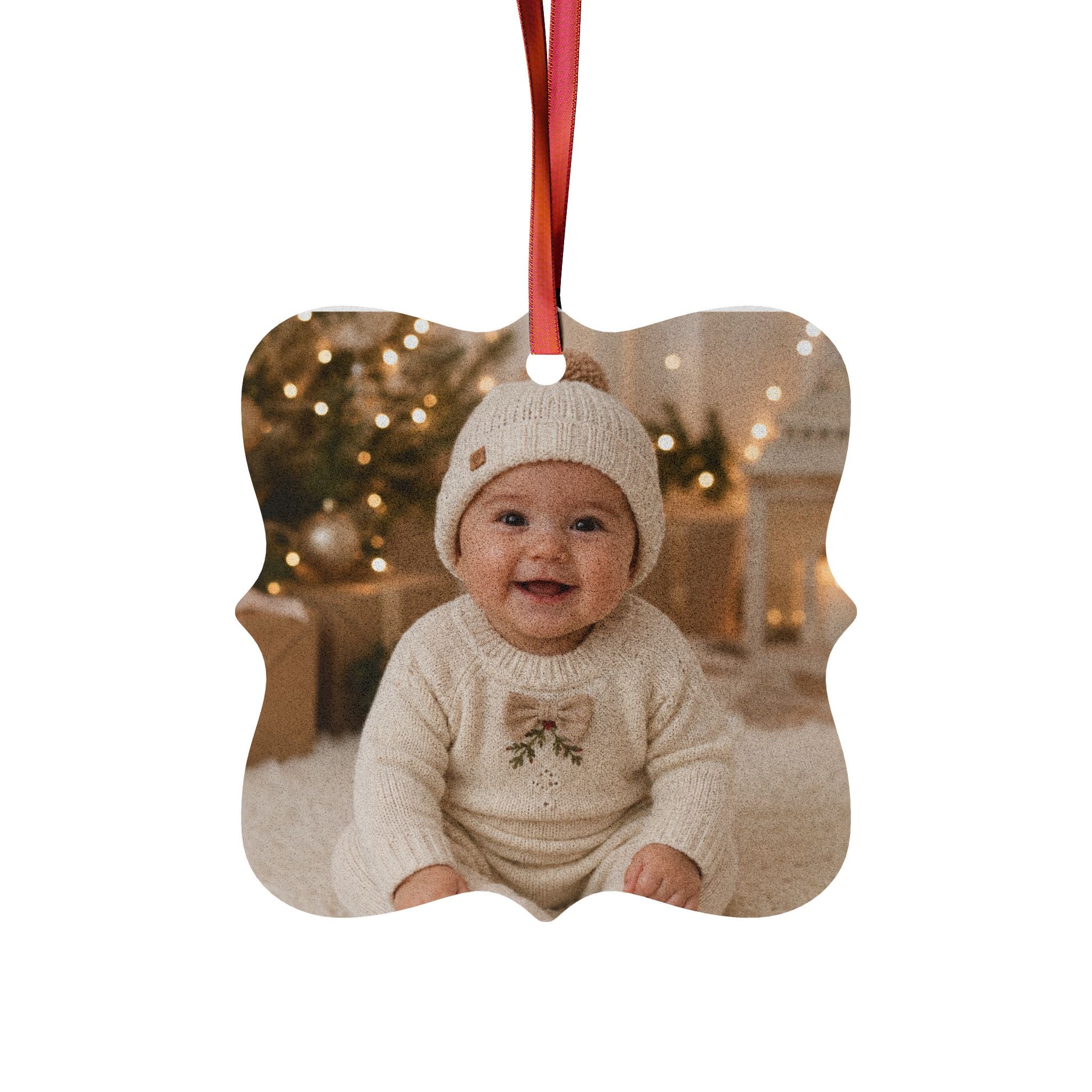 Personalized baby photo ornament in the medallion shape with a brushed metal look