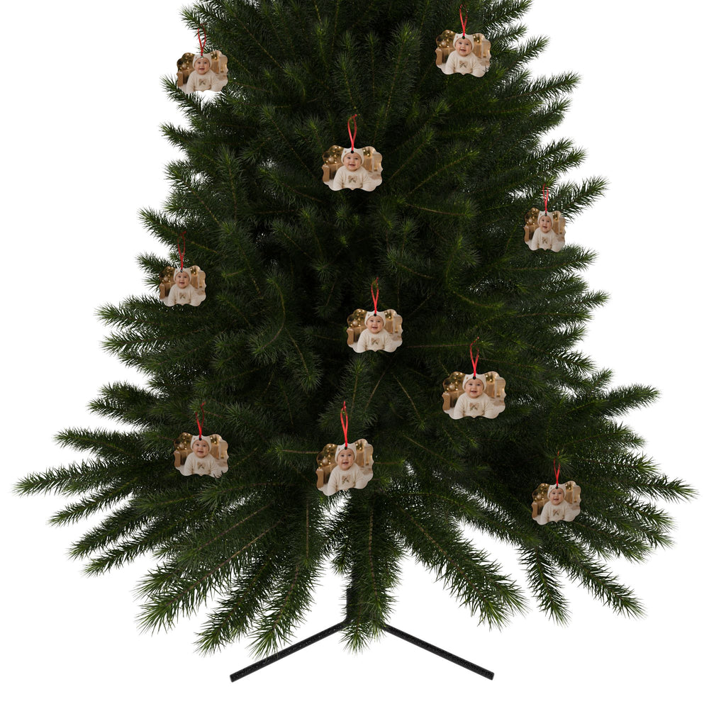 Personalized baby photo ornament hanging on a Christmas tree