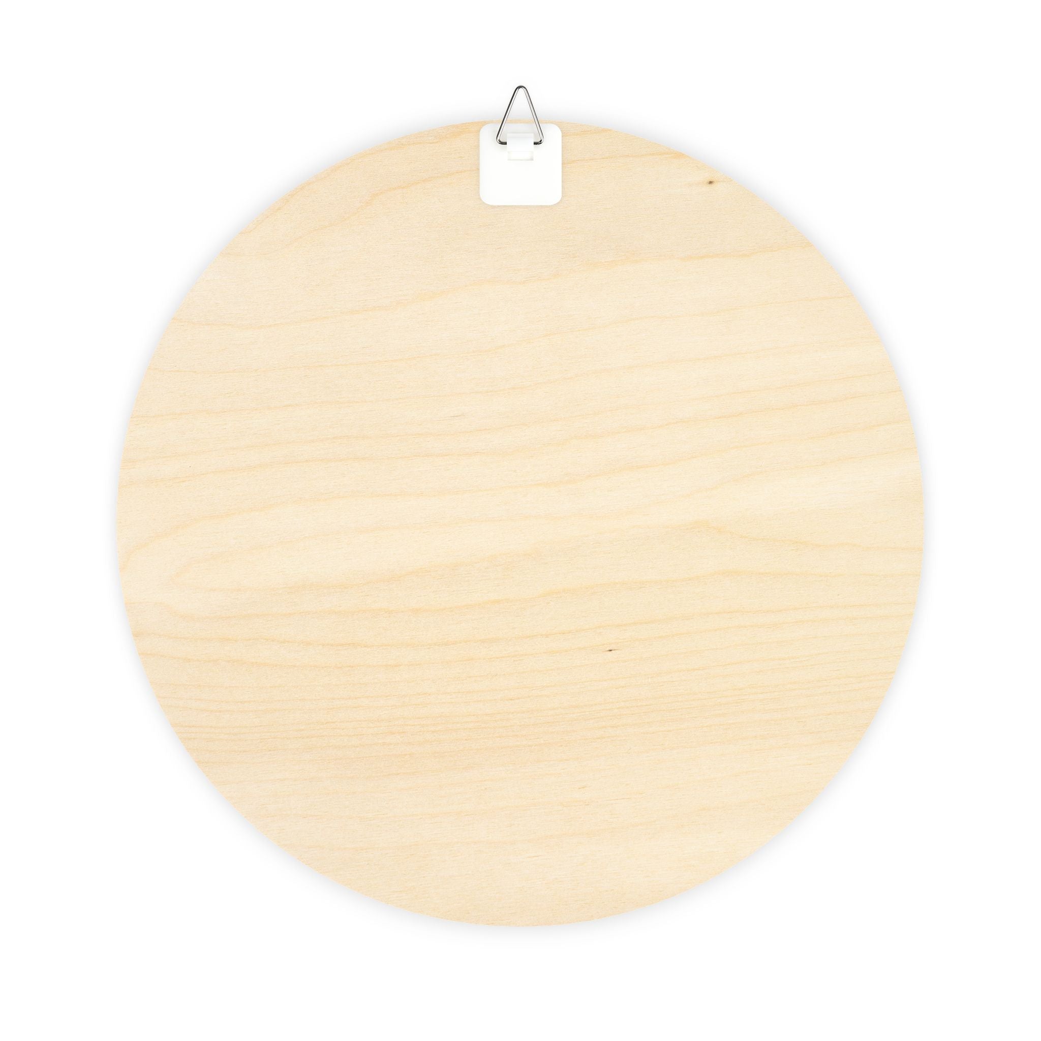 Christmas wood plaque shown hanging by a door with jute twine and metal hook