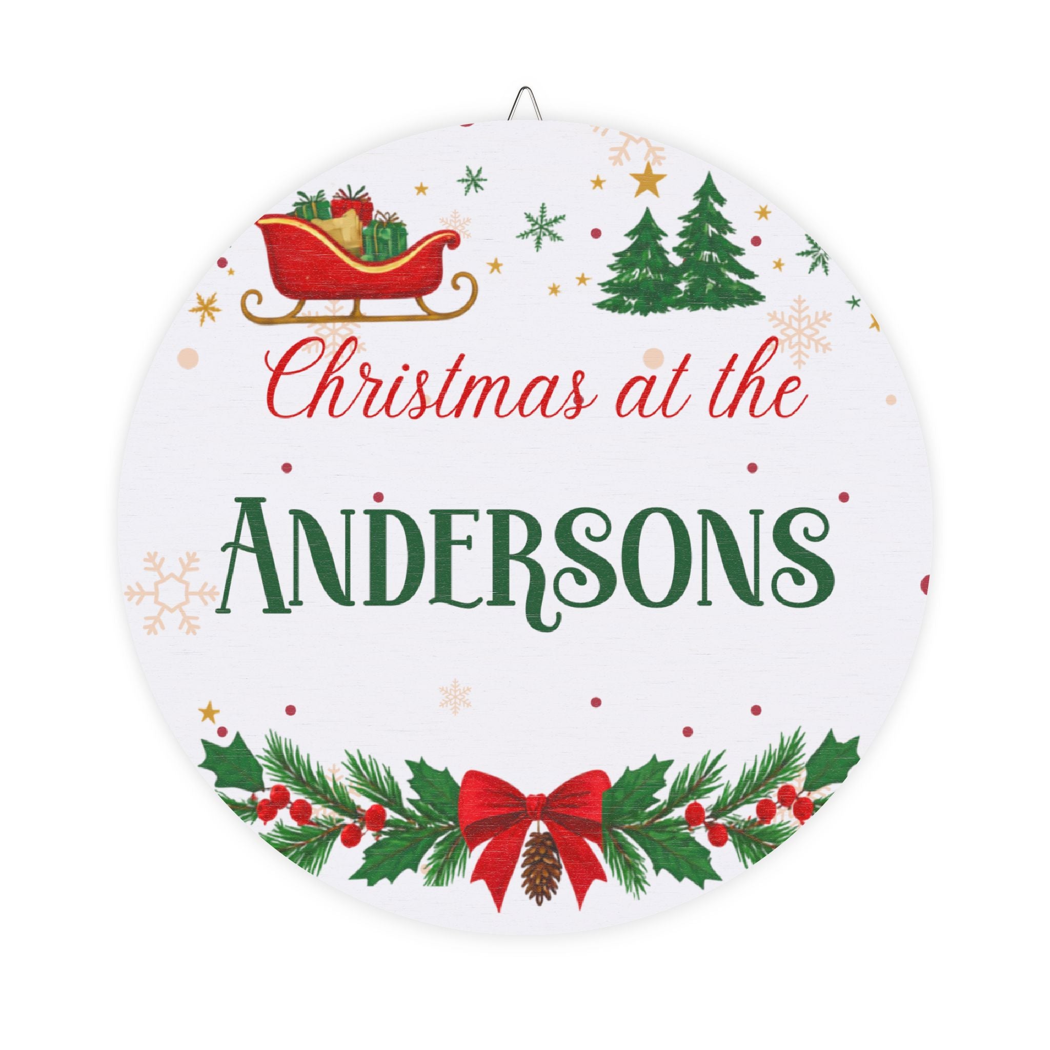 Personalized Christmas wood plaque with a family name, a red sleigh and holly garland on round birch
