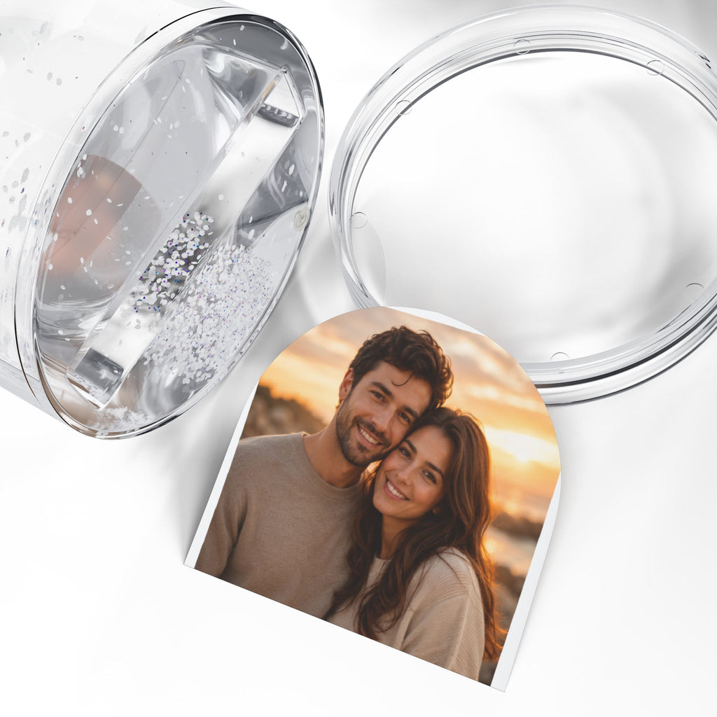 Couple photo snow globe displayed on a shelf as a romantic keepsake