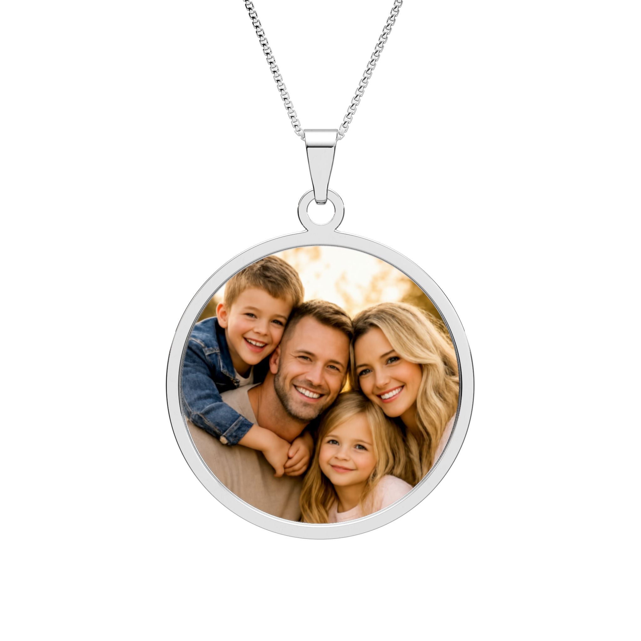 Personalized family photo necklace in a sterling silver round pendant with an engraved border on a box chain