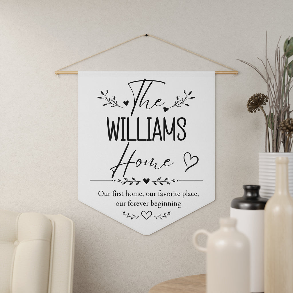 First home pennant shown hanging on a wall as personalized new home decor