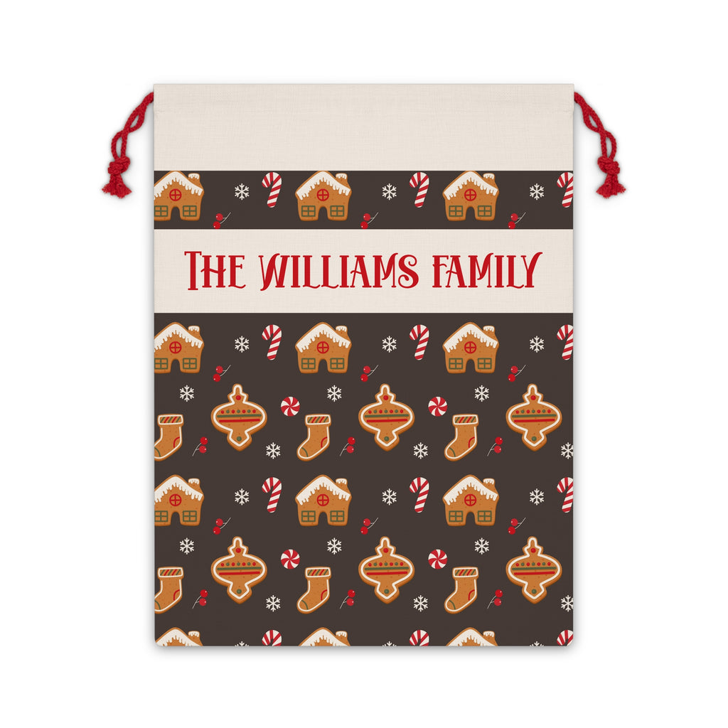 Personalized gingerbread Santa sack with a family name band, gingerbread houses and candy canes on a brown drawstring bag