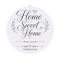 Personalized Home Sweet Home wood plaque with an established year and family name in script on round birch