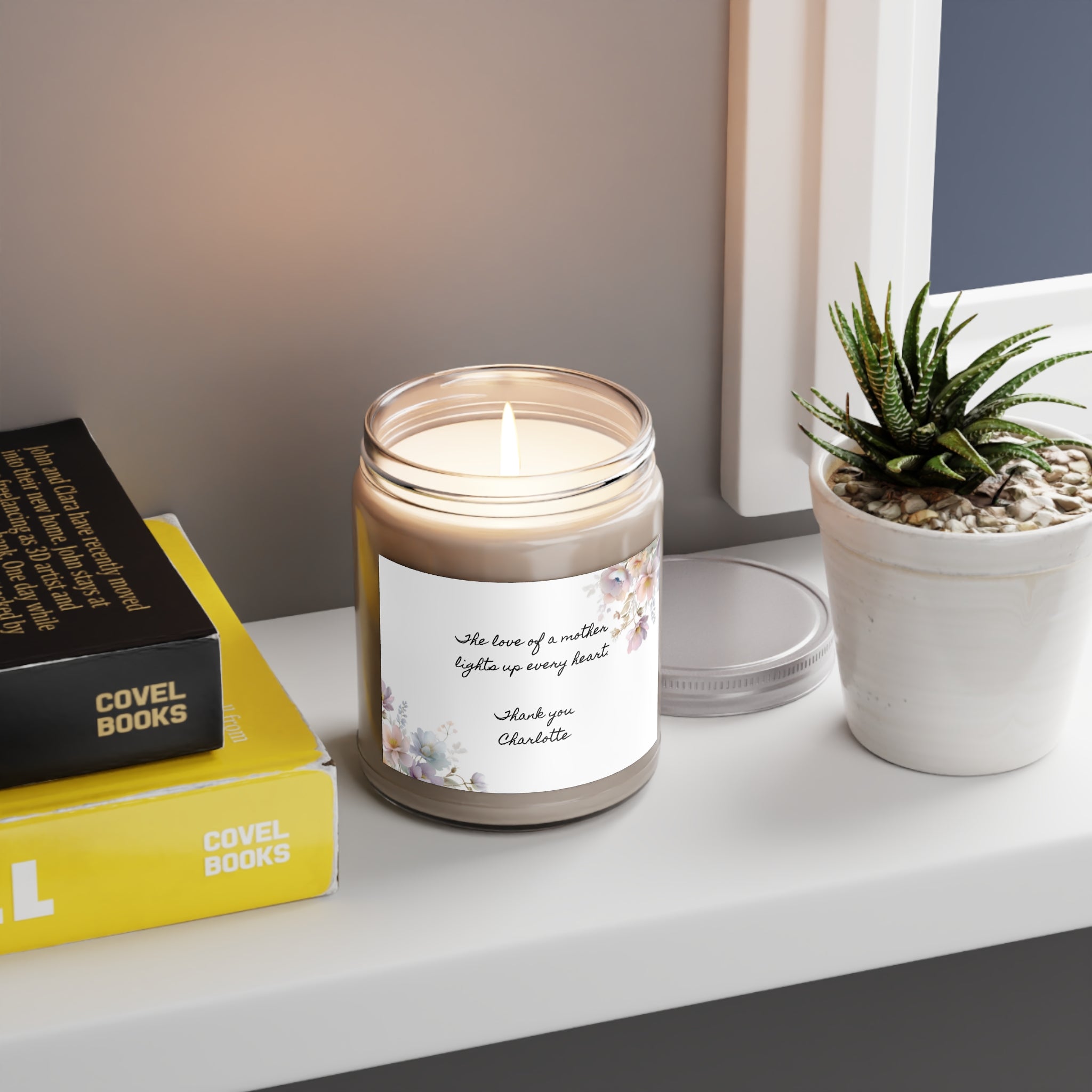 9 oz clear glass mom candle with a white lid showing the jar size