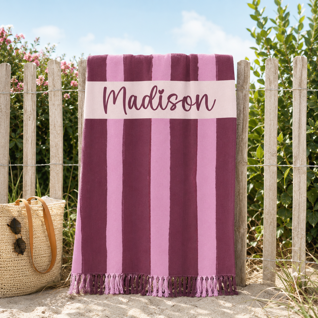 Pink stripe beach towel design detail with custom name banner