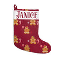 Personalized red gingerbread Christmas stocking with candy canes and peppermints and a custom name panel at the top