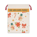 Personalized snowman Santa sack with a family name band, snowmen, candy canes and poinsettias on a cream drawstring bag