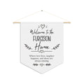 Personalized welcome home pennant with a family name and the words Where love lives, laughter happens, and shoes are always missing