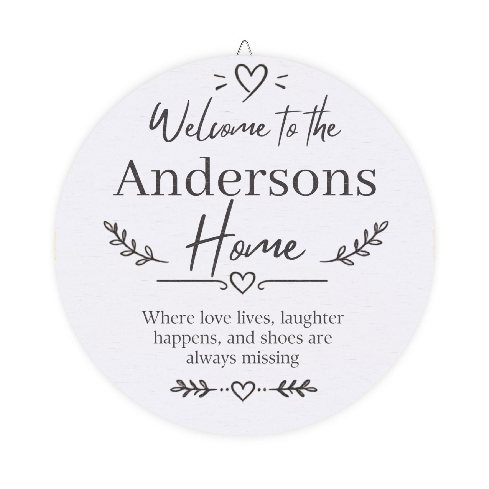 Personalized welcome home wood plaque with a family name and the words Where love lives, laughter happens, and shoes are always missing