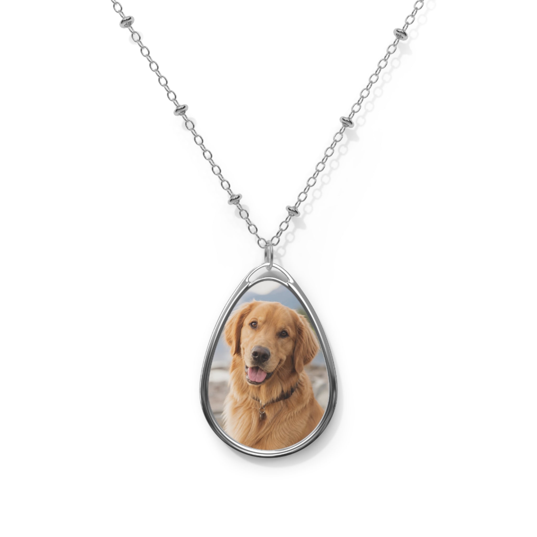 Dog's photo on a personalized teardrop pendant necklace on a silver beaded chain