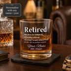 Close-up of the personalized 'Retired' definition retirement glass design