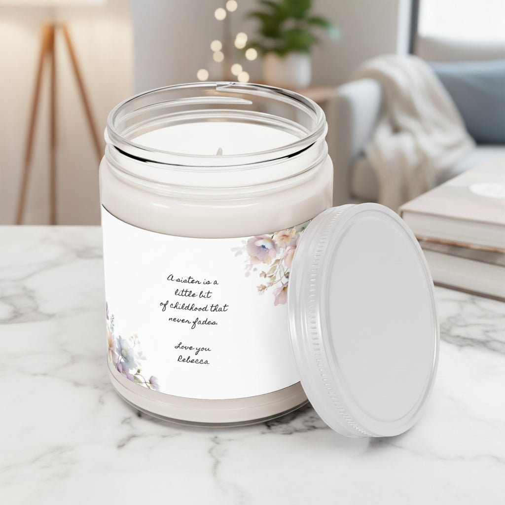 Hand-poured soy sister candle styled beside fresh flowers