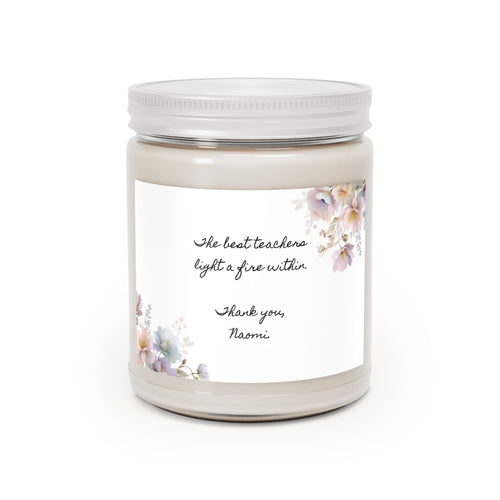 Personalized teacher appreciation soy candle in a white-lid glass jar with a watercolor floral label reading The best teachers light a fire within