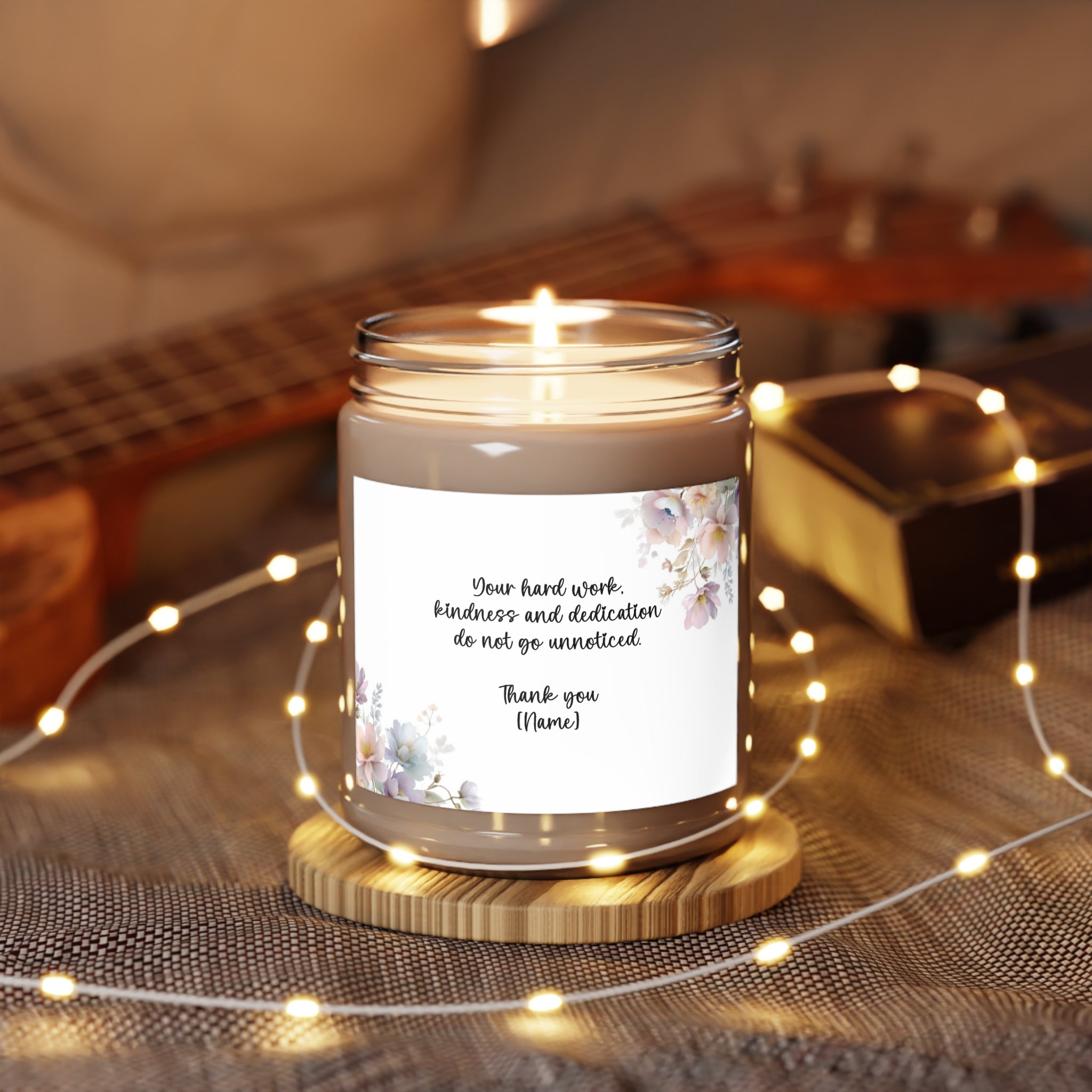 Close-up of the personalized appreciation message on the candle