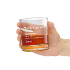 Hand holding a personalized 'Work-Free Since' whiskey rocks glass with whiskey